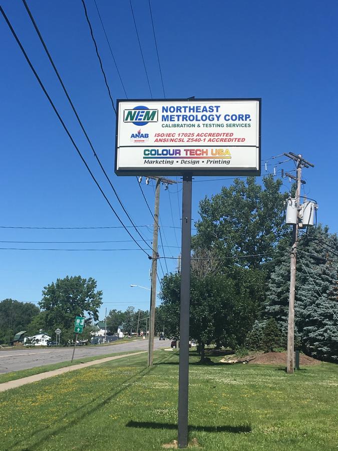 Northeast Metrology Corp. Street Sign